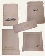 set of white linens on a plain background